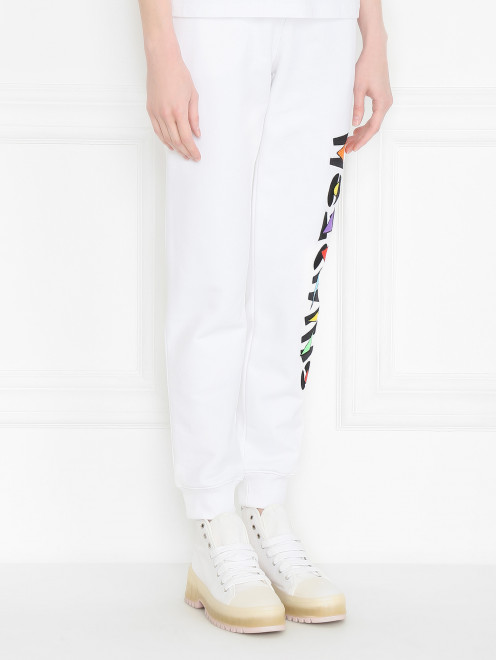 Трикотажные брюки из хлопка декорированные вышивкой Moschino - МодельВерхНиз